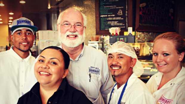 Father Greg Boyle and crew members at Homegirl Cafe