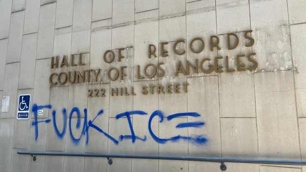The Los Angeles County Hall of Records is tagged with profanities against ICE.
