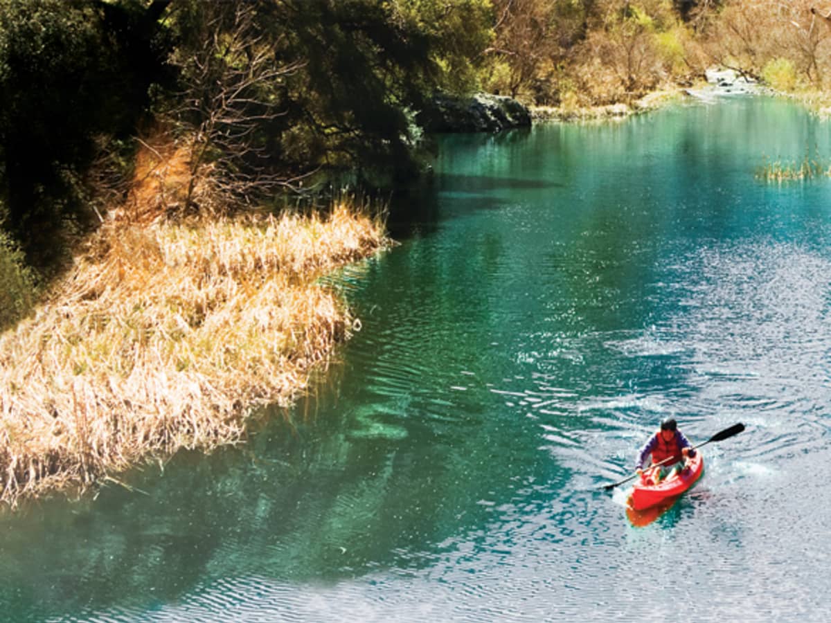 https://lamag.com/.image/ar_4:3%2Cc_fill%2Ccs_srgb%2Cfl_progressive%2Cq_auto:eco%2Cw_1200/MTk3NTU1NjIzNjA0NDYzMjk2/a-man-kayaking-on-a-river-in-a-park.jpg