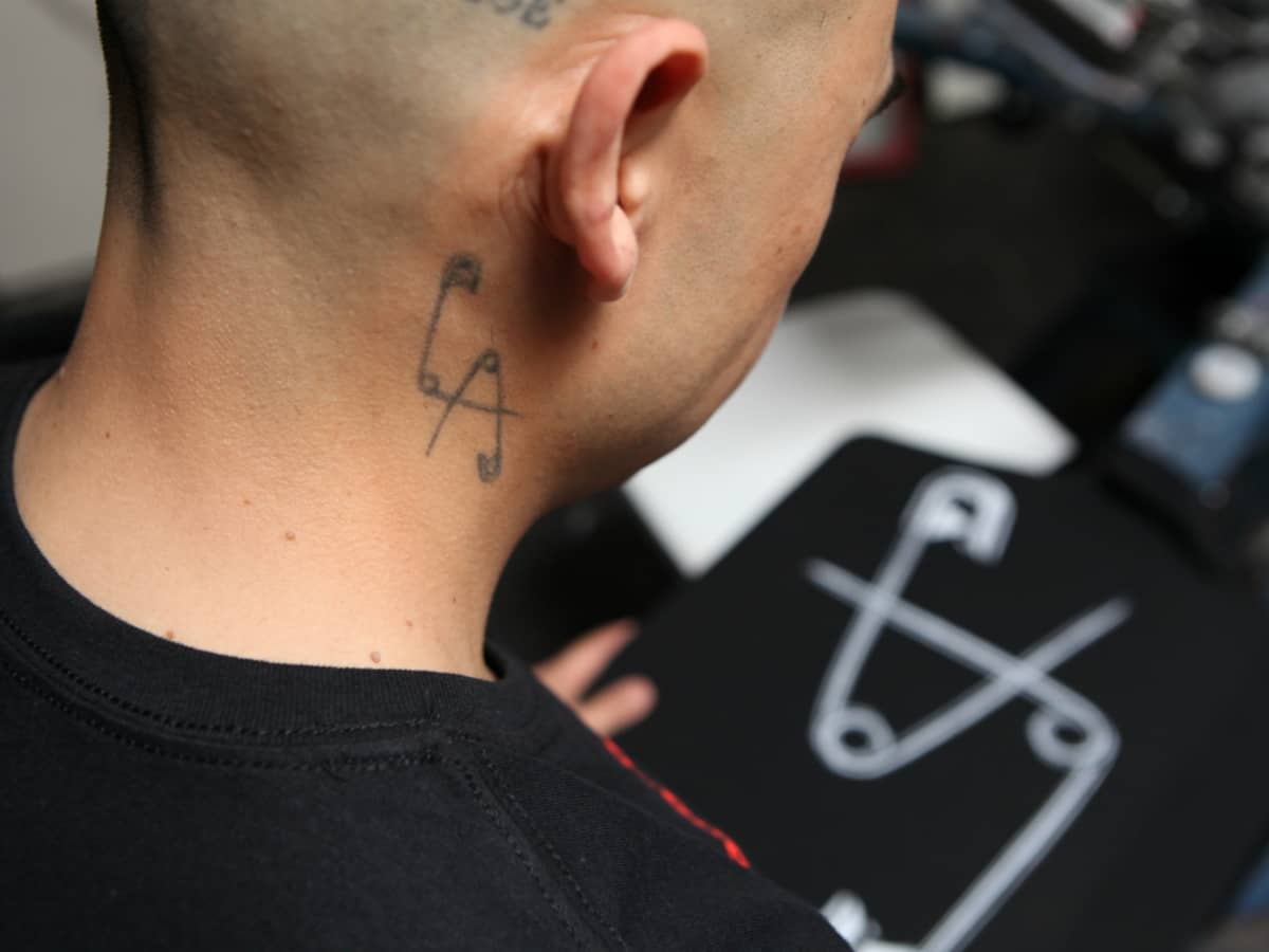 Safety shop pin tattoo