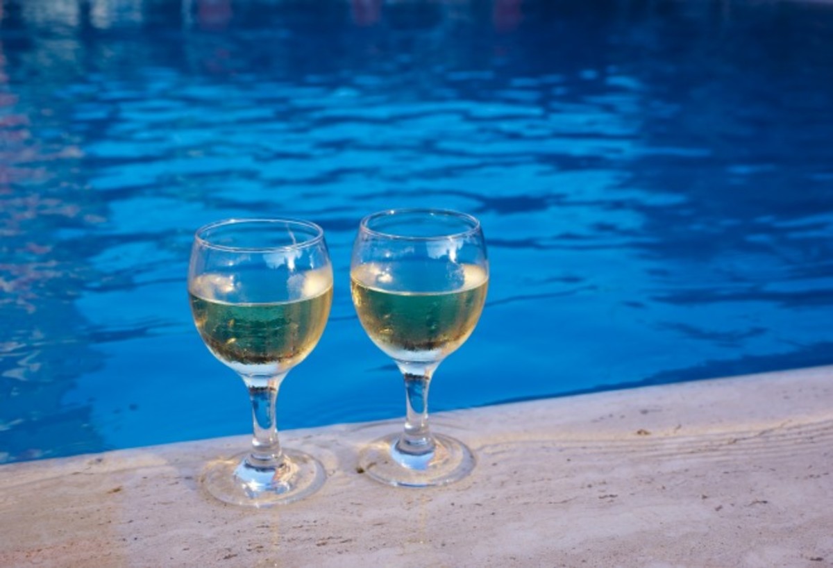 A Glass Of Wine In Front Of A Fireplace Fleece Blanket